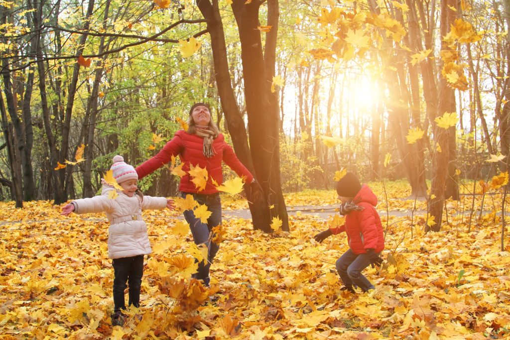 Happy family in autumn